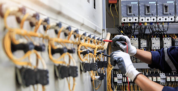 Professional Electrician technician working in Little Rock, AR